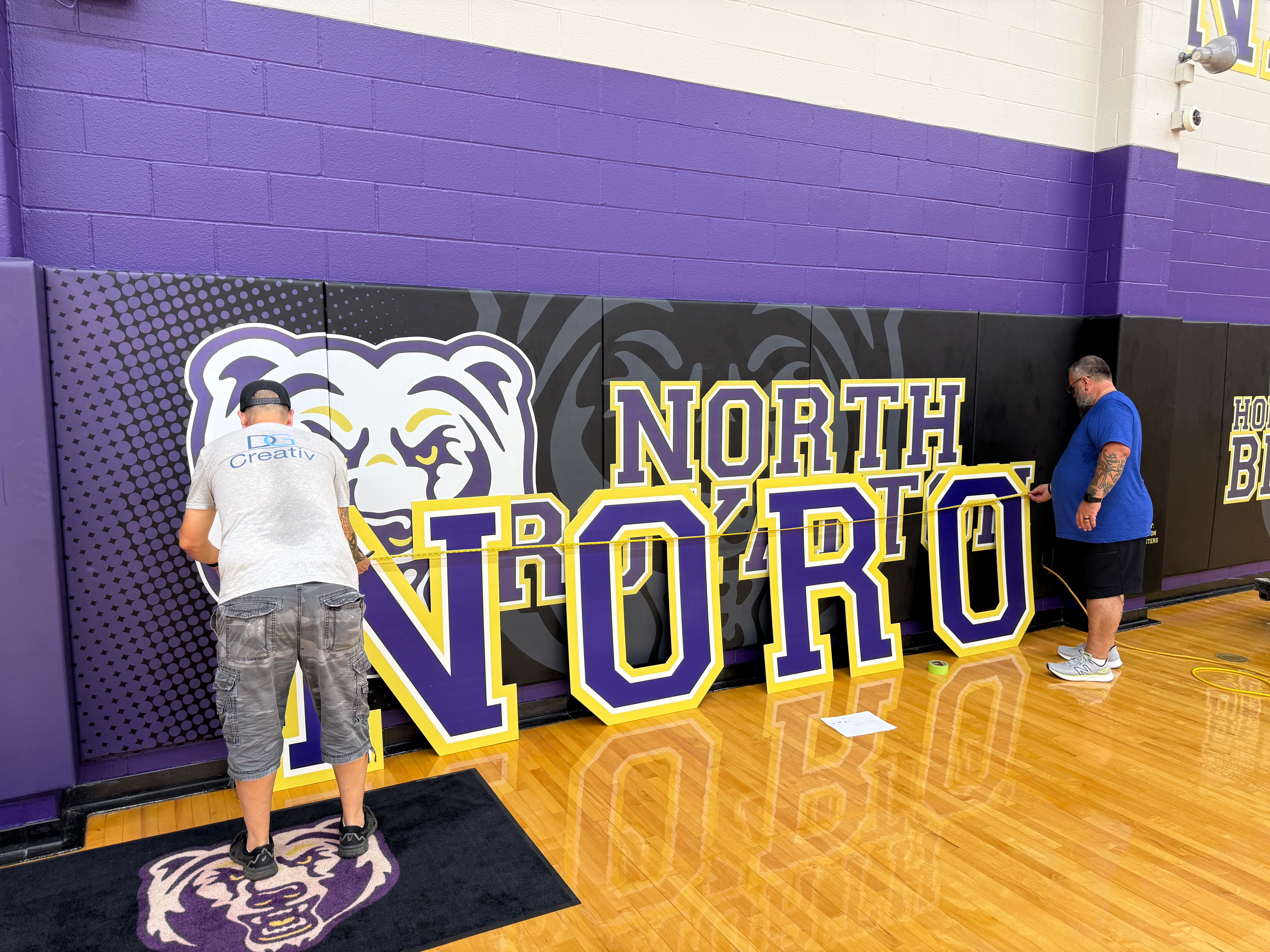 Massive 36-foot Noro Nation gym wall lettering cut from 6mm PVC Sintra using Zund CNC technology