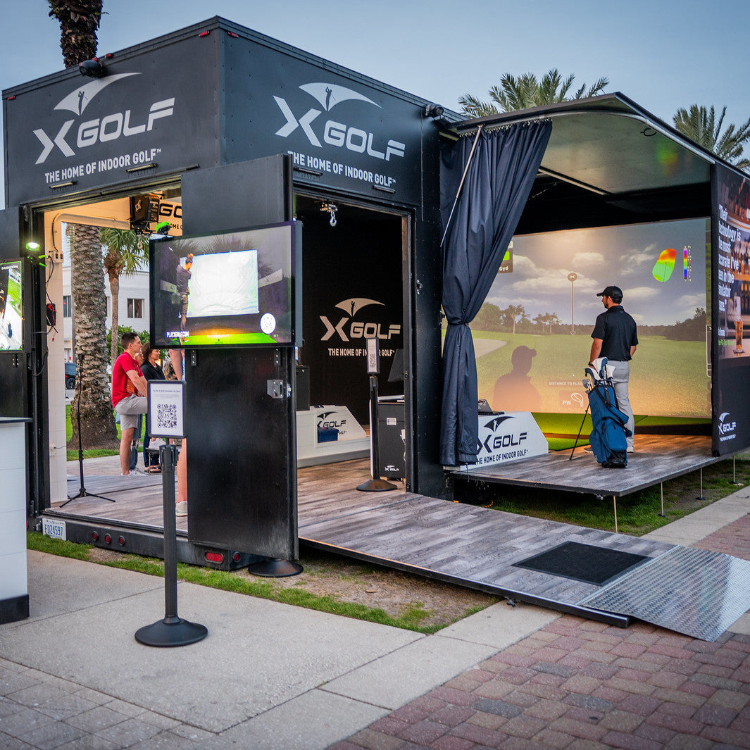 Custom shipping containers for events and festivals with custom printed vehicle wrap sticker, golf simulator, HVAC and electrical. In Cleveland, OH, Boston, MA, New York, NY, Los Angelas, CA, Dallas TX, Orlando, FL, Chicago, IL