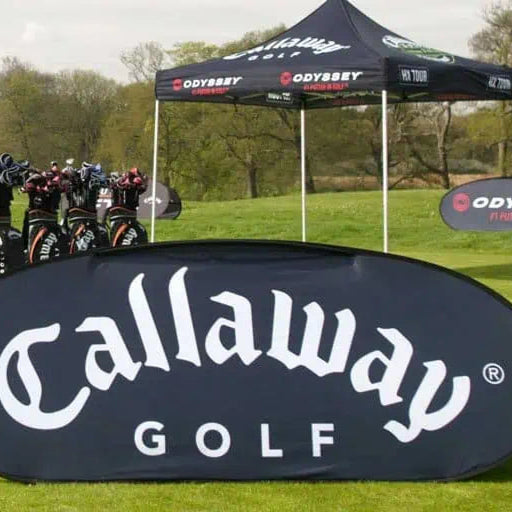 A black pop-up horizontal banner with the 'Calloway Golf' brand logo displayed at a golf event, with a group of golfers in the background. Cleveland, OH