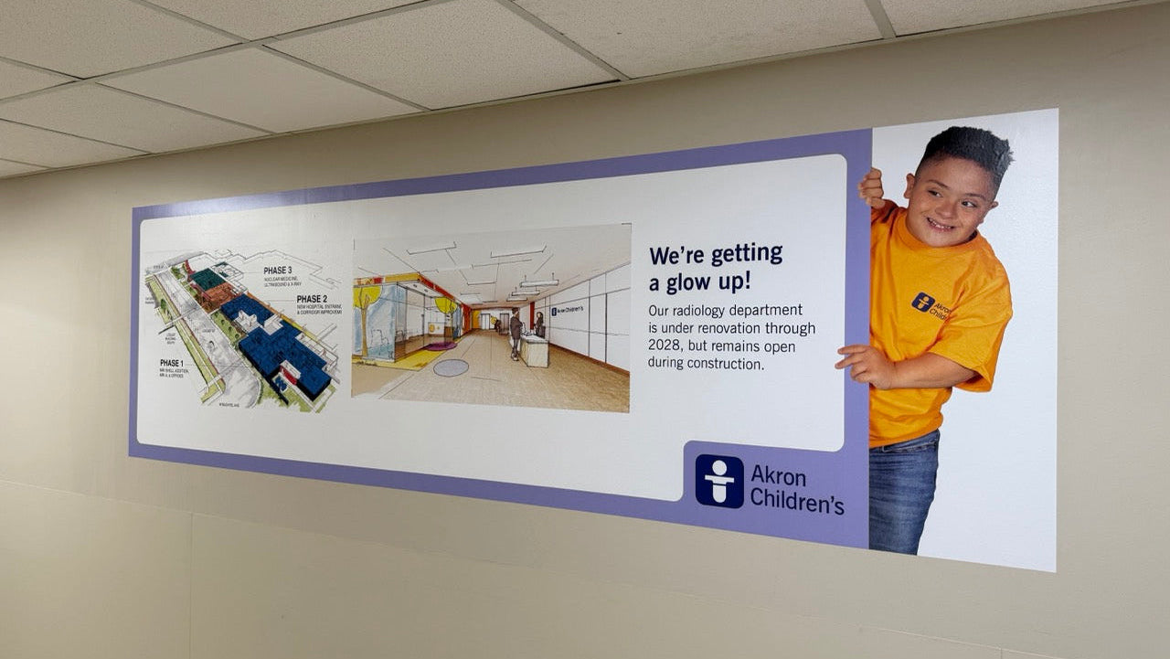 Full-coverage hallway wall mural promoting the upcoming Radiology Department construction.